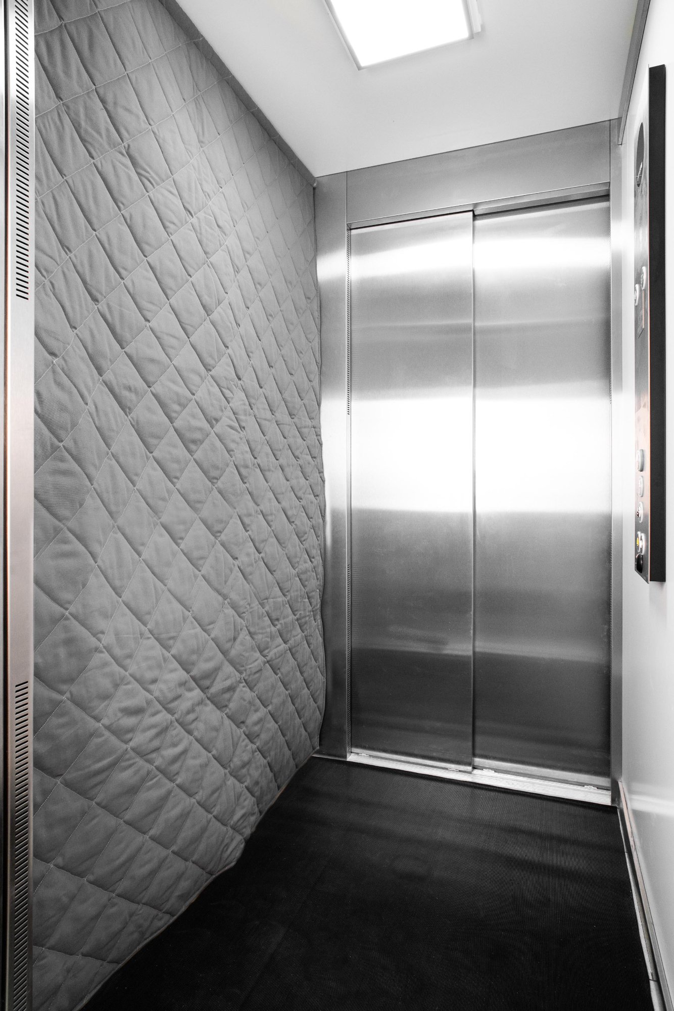 Bâche protection ascenseur installation complète